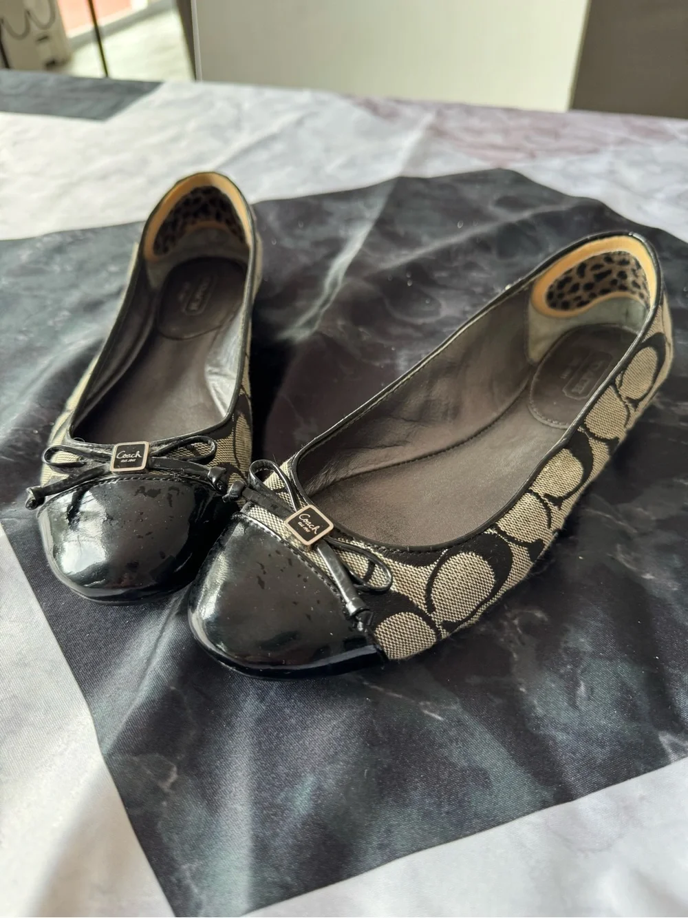Coach Black and Tan Signature Canvas Ballet Flats